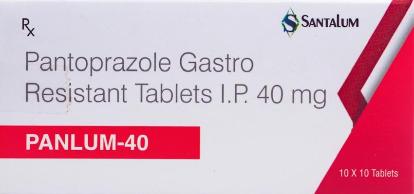White pill bottle with red capsules